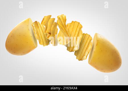 La patata cruda si trasforma in gustose patatine croccanti all'aria su sfondo chiaro Foto Stock