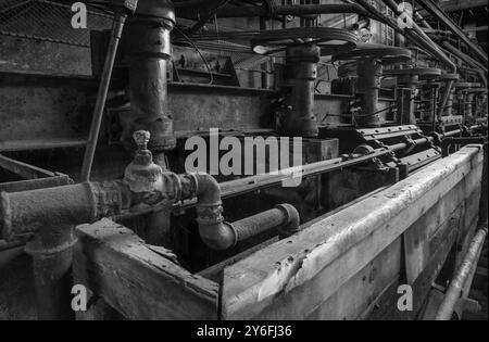 macchinari storici di un sito minerario abbandonato Foto Stock