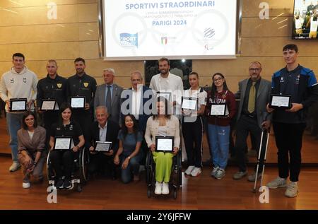 Cerimonia di premiazione per le atlete emiliane coinvolte nelle Olimpiadi e Paralimpiadi di Parigi 2024 - partecipanti: Irene Priolo presidente facente funzione della regione, A. Dondi presidente regionale del coni, D. Scazzieri vicepresidente regionale del CIP, G. Manghi capo della segreteria politica della Presidenza della regione, allenatore della nazionale femminile di pallavolo Julio Velasco, gli olimpici G. Paltrinieri (nuoto - argento e bronzo), E. Imorio (donne) (ginnastica ritmica di squadra - bronzo), L. Samele (bronzo a sciabola individuale), L. Rambaldi (ROW Foto Stock