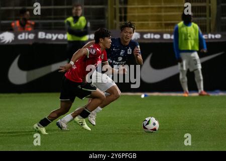 Hayate Matsuda (Hannover 96 II, n. 3) gegen Soichiro Kozuki (TSV 1860 Muenchen, n. 14). GER, TSV 1860 Muenchen gegen Hannover 96 II U23, Fussball, 3. Bundesliga, 7 anni. Spieltag, Saison 2024/2025, 25.09.2024. (LE NORMATIVE DFL DFB VIETANO QUALSIASI USO DI FOTOGRAFIE COME SEQUENZE DI IMMAGINI E/O QUASI-VIDEO). Foto: Eibner-Pressefoto/Heike Feiner Foto Stock