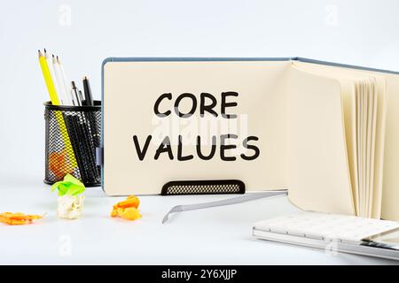 Concetto di business e core value su un foglio vuoto di blocco note nello stand Foto Stock