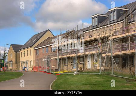 Cantiere - Un moderno sviluppo che fornisce proprietà residenziali per soddisfare le attuali esigenze abitative del Regno Unito. Foto Stock