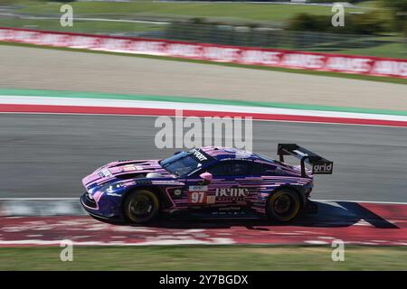 97 Martin BERRY (SGP), Lorcan HANAFIN (GBR), Jonathan ADAM (GBR), GRID MOTORSPORT BY TF, Aston Martin Vantage AMR LMGT3 durante ELMS - 4 ore di Mugello, Endurance race in Mugello, Italia, settembre 29 2024 Foto Stock