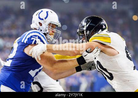 29 settembre 2024: L'offensive lineman degli Indianapolis Colts Braden Smith (72) e il linebacker dei Pittsburgh Steelers T.J. Watt (90) combattono sulla linea di scrimmage durante la partita NFL al Lucas Oil Stadium di Indianapolis, Indiana. John Mersits/CSM. Foto Stock