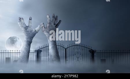 Mani di mamma in bende che si alzano dal cimitero, con un'atmosfera inquietante, scura e spaventosa. La mano sembra essere un diavolo, un male, un satana, uno zombie o un Foto Stock