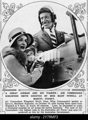 UN GRANDE AVIATORE E LA SUA FINACEE : IL COMMODORO DELL'ARIA KINGSFORD SMITH SALUTATO DALLA SIGNORINA MARY POWELL ALLA MASCOTTE DI SYDNEY, AUSTRALIA. Il Commodoro dell'aria Kingsford Smith (allora Wing Commander) sbarcò a Darwin, nell'Australia settentrionale, il 19 ottobre 1930, avendo volato lì dall'Inghilterra in 9 giorni, 21 ore e 40 minuti. In seguito, procedette a fare un progresso trionfale via aerea attraverso la sua nativa Australia. Il grado di Air Commodore - il più alto grado dell'Australian Air Force - gli è stato specificamente conferito dal governo australiano. 29 novembre 1930 Foto Stock