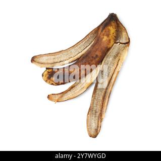 Buccia di banana con macchie scure isolate su bianco, vista dall'alto Foto Stock