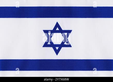 Primo piano su sfondo Flat Israel Fabric Flag. Foto Stock