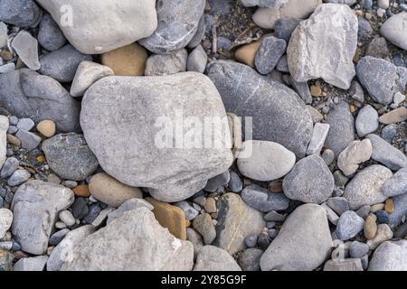 Raccolta di rocce pietre e ciottoli come sfondo Foto Stock