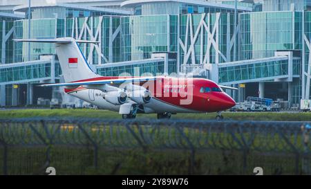 Balikpapan, Indonesia - 26 settembre 2024. Il jet presidenziale indonesiano, Avro RJ85 con coda a T e quattro motori turbofan, al Sultan Aji Muhamma Foto Stock