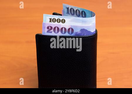 New Taiwan money - dollaro nel portafoglio nero Foto Stock