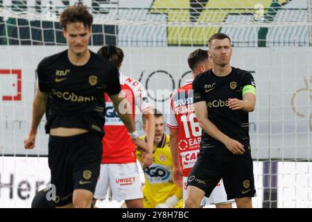 Kortrijk, Belgio. 5 ottobre 2024. Bryan Heynen di Genk sembra sgretolato durante una partita di calcio tra KV Kortrijk e KRC Genk, sabato 05 ottobre 2024 a Kortrijk, il giorno 10 della stagione 2024-2025 della 'Jupiler Pro League' prima divisione del campionato belga. BELGA FOTO KURT DESPLENTER credito: Belga News Agency/Alamy Live News Foto Stock