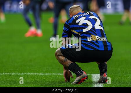 Federico Dimarco del FC Internazionale reagisce al termine della partita durante la partita di serie A 2024/25 tra FC Internazionale e Torino FC allo Stadio San Siro Foto Stock