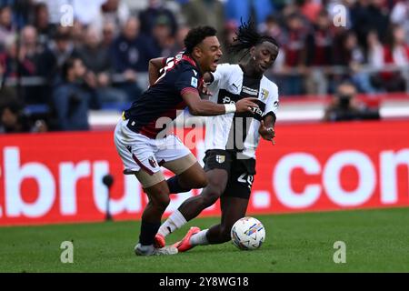 Dan Ndoye (Bologna) Woyo Coulibaly (Parma) durante la partita di serie A italiana tra Bologna 0-0 Parma allo Stadio Renato Dallara 5 ottobre 2024 a Bologna. Crediti: Maurizio Borsari/AFLO/Alamy Live News Foto Stock