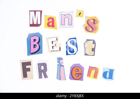 Phrase Man's Best Friend scritto in tipografia tagliata in stile giornale isolata su sfondo bianco. Foto Stock