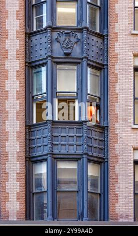 Ahrens Building, costruito nel 1895, è stato accuratamente restaurato per mostrare elaborati mattoni policromi e dettagli in terracotta. Foto Stock