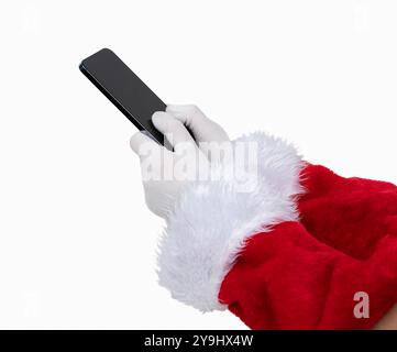 Profilo di un Babbo Natale con le mani in mano con un telefono cellulare con i pollici isolati su uno sfondo bianco Foto Stock