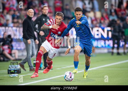 Silkeborg, Danimarca. 22 settembre 2024. Oliver Sonne (5) di Silkeborg IF e Clement Bischoff (37) di Broendby IF visto durante il 3F Superliga match tra Silkeborg IF e Broendby IF a Jysk Park di Silkeborg. Foto Stock