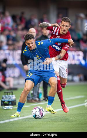 Silkeborg, Danimarca. 22 settembre 2024. Oliver Sonne (5) di Silkeborg IF e Clement Bischoff (37) di Broendby IF visto durante il 3F Superliga match tra Silkeborg IF e Broendby IF a Jysk Park di Silkeborg. Foto Stock