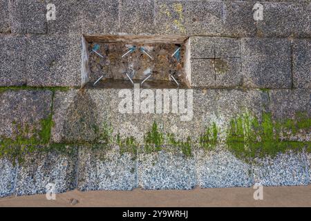 Sono previste importanti riparazioni per proteggere le pareti marittime di Filey da un ulteriore deterioramento Foto Stock