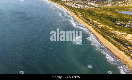Florianopolis, spiaggia di Campeche all'alba. Brasile. Quartiere di Rio Tavares Foto Stock