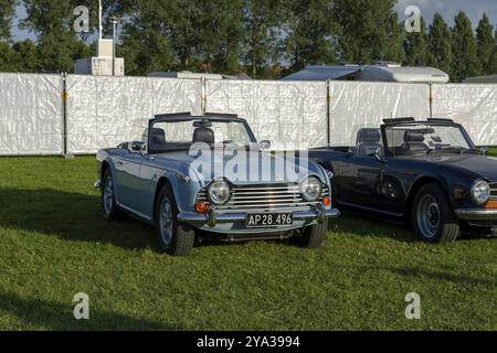 Copenaghen, Danimarca, 2 agosto 2024: Un'auto d'epoca TR250 blu al Copenhagen Historic Grand Prix, Europa Foto Stock