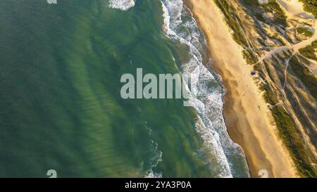 Florianopolis, spiaggia di Campeche all'alba. Brasile. Quartiere di Rio Tavares Foto Stock