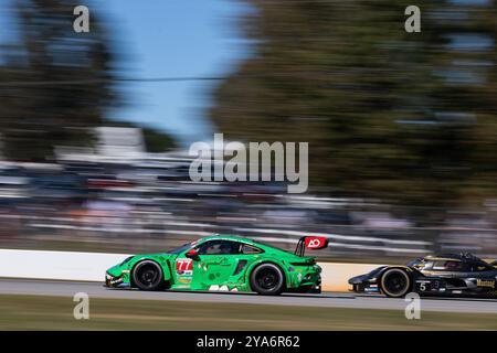 77 HEINRICH Laurin (deu), ANDLAUER Julien (fra), CHRISTENSEN Michael (dnk), AO Racing, Porsche 911 GT3 R, azione durante il Motul Petit le Mans 2024, 11° round del Campionato IMSA Sportscar 2024, dal 10 al 12 ottobre 2024 sul circuito Michelin Raceway Road Atlanta a Braselton, Georgia, Stati Uniti d'America - Photo Joao Filipe/DPPI Credit: DPPI News Live/Alamy Foto Stock