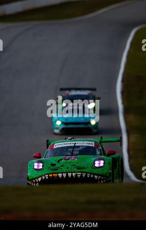 77 HEINRICH Laurin (deu), ANDLAUER Julien (fra), CHRISTENSEN Michael (dnk), AO Racing, Porsche 911 GT3 R, azione durante il Motul Petit le Mans 2024, 11° round del Campionato IMSA Sportscar 2024, dal 10 al 12 ottobre 2024 sul circuito Michelin Raceway Road Atlanta a Braselton, Georgia, Stati Uniti d'America - Photo Joao Filipe/DPPI Credit: DPPI News Live/Alamy Foto Stock