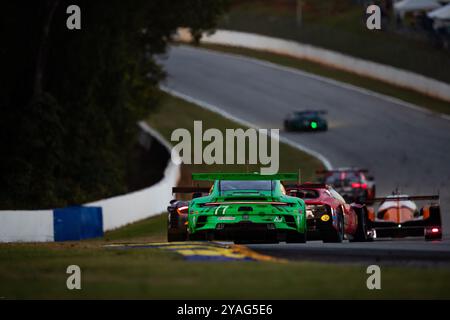 77 HEINRICH Laurin (deu), ANDLAUER Julien (fra), CHRISTENSEN Michael (dnk), AO Racing, Porsche 911 GT3 R, azione durante il Motul Petit le Mans 2024, 11° round del Campionato IMSA Sportscar 2024, dal 10 al 12 ottobre 2024 sul circuito Michelin Raceway Road Atlanta a Braselton, Georgia, Stati Uniti d'America - Photo Joao Filipe/DPPI Credit: DPPI News Live/Alamy Foto Stock