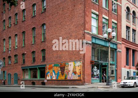 Murale sull'edificio brock all'angolo della strada a Seattle Foto Stock