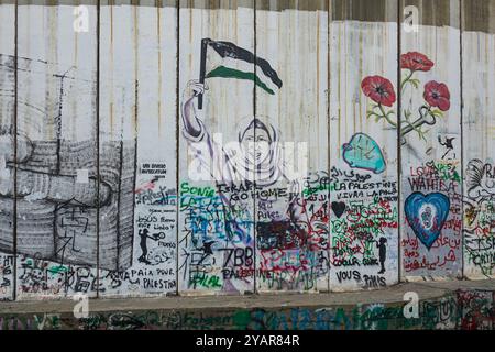 Graffiti sul muro di separazione a Betlemme, in Cisgiordania, Palestina. Foto Stock