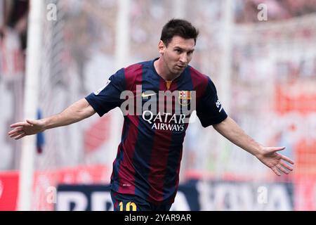 Madrid, Spagna 04/10/2014:Lionel messi celebra un gol durante la partita tra Rayo Vallecano e Barcellona (foto di Guillermo Martinez) Foto Stock