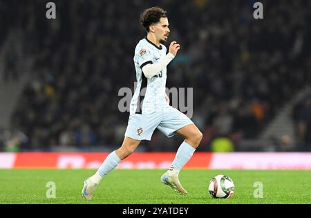 Glasgow, Regno Unito. 15 ottobre 2024. Vitinha del Portogallo durante la partita di UEFA Nations League a Hampden Park, Glasgow. Il credito per immagini dovrebbe essere: Neil Hanna/Sportimage Credit: Sportimage Ltd/Alamy Live News Foto Stock