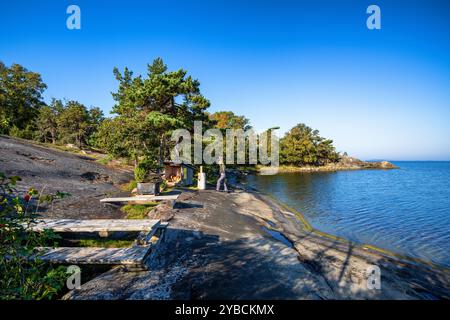 Produzione di legna da ardere nell'isola di Stora Hästö, Parainen, Finlandia Foto Stock