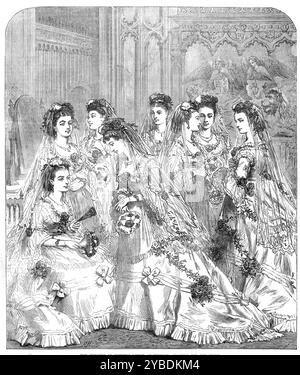 The Wedding of Princess Louise at Windsor: Waiting for the Bride, 1871. Matrimonio reale della principessa Luisa (quarta figlia della regina Vittoria) e di suo marito John Campbell, IX duca di Argyll. Il ciondolo dato da sua altezza reale alle damigelle e' stato prodotto dai signori London e Ryder. Il suo design è stato assistito da schizzi realizzati dalla Principessa stessa... questi ciondoli sono stati indossati dalle otto damigelle durante la cerimonia nuziale di martedì. Da "Illustrated London News", 1871. Foto Stock