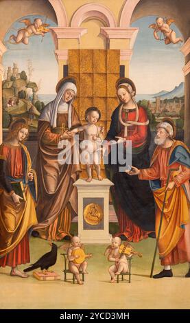 Pavia - il dipinto rinascimentale di Gesù bambino con Madonna, san Anna, Gioacchino, San Giovanni nella chiesa di Santa Maria del Carmine Foto Stock