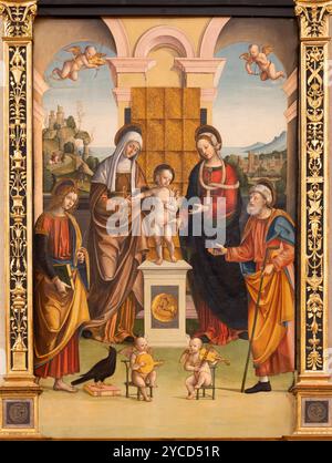 Pavia - il dipinto rinascimentale di Gesù bambino con Madonna, san Anna, Gioacchino, San Giovanni nella chiesa di Santa Maria del Carmine Foto Stock