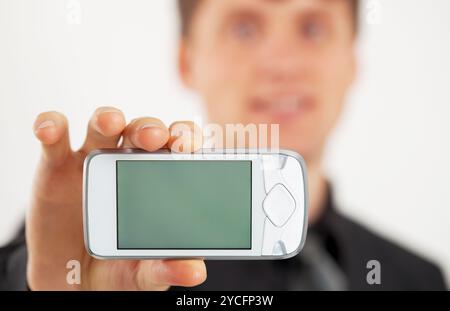 Man mostra il telefono cellulare con schermo LCD Foto Stock
