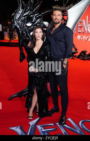 Cally Jane Beech e DJ o'Neal partecipano alla prima di Venom: The Last Dance UK al BFI IMAX di Londra. Data foto: Mercoledì 23 ottobre 2024. Foto Stock