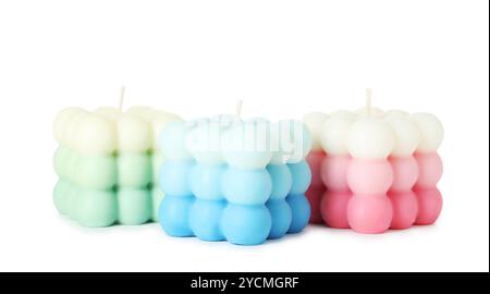 Tre bellissime candele a bolle isolate su bianco Foto Stock