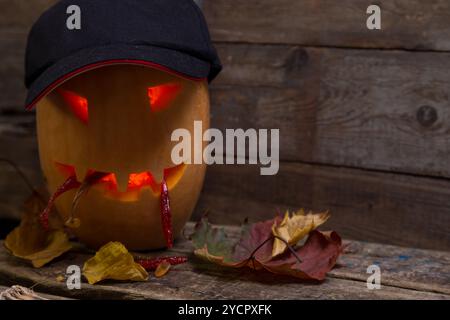 Testa di zucca di Halloween con bastoncini da pesca Foto Stock