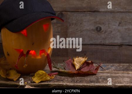 Testa di zucca di Halloween con bastoncini da pesca Foto Stock