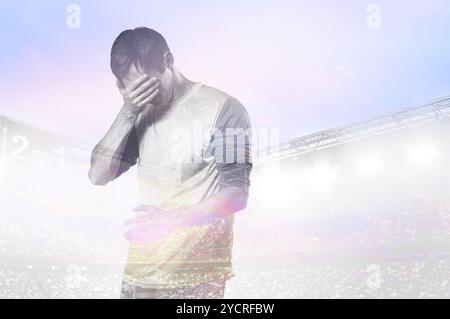 Infelice giocatore di calcio o di calcio Foto Stock