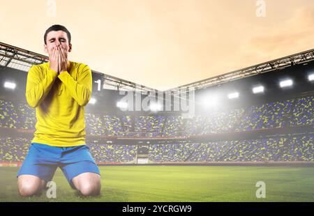 Triste giocatore di calcio Foto Stock