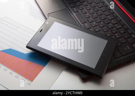 Tablet computer e materiale grafico Foto Stock