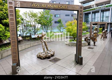 Giappone, isola di Honshu, Kanto, Oizumi Gakuen, varie statue mangas alla porta Anime di Oizumi. Foto Stock