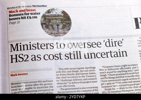Gabinetto "i ministri sorvegliano "dire" HS2 come costo ancora incerto" testata del quotidiano Guardian articolo 21 ottobre 2024 Londra Inghilterra Regno Unito Foto Stock