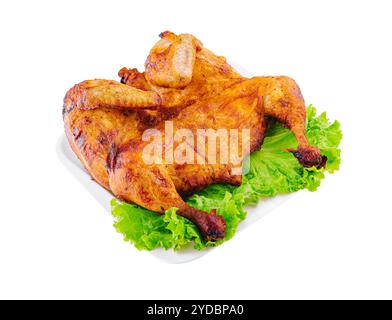 Pollo arrosto servito su un piatto bianco Foto Stock