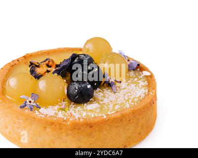 Tartlet di limone con mirtilli e uva Foto Stock